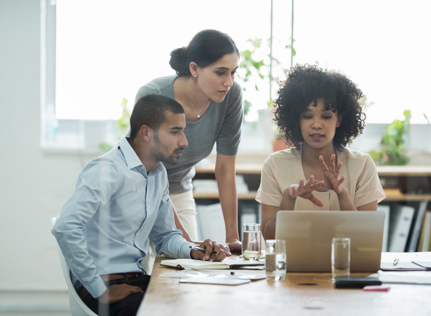 Cropped shot of a group of business colleagues meeting in the boardroom